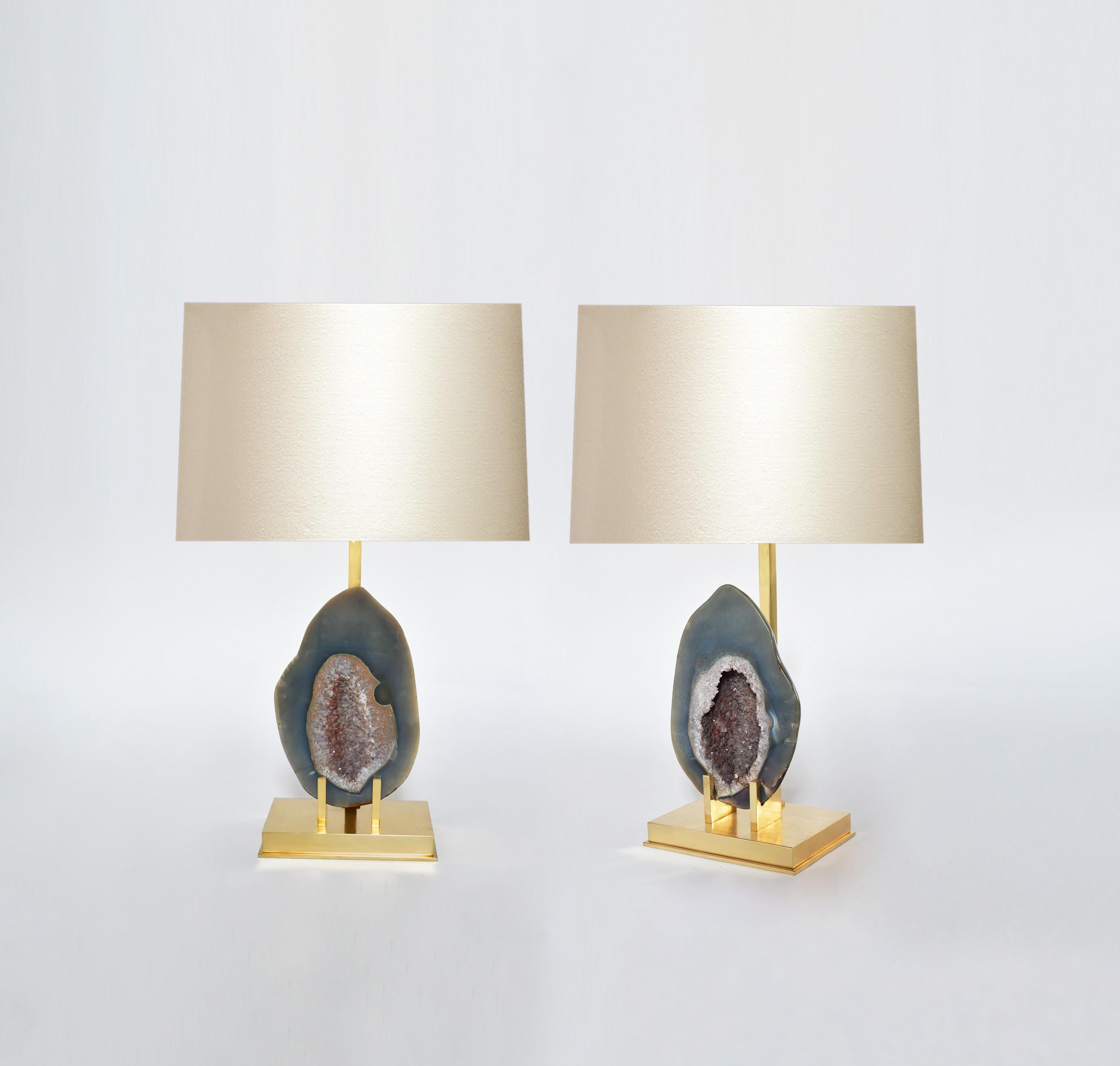 Pair of rare natural agates mount as lamps with custom polished brass bases.
Each lamp installs two sockets.
Lampshade do not include.