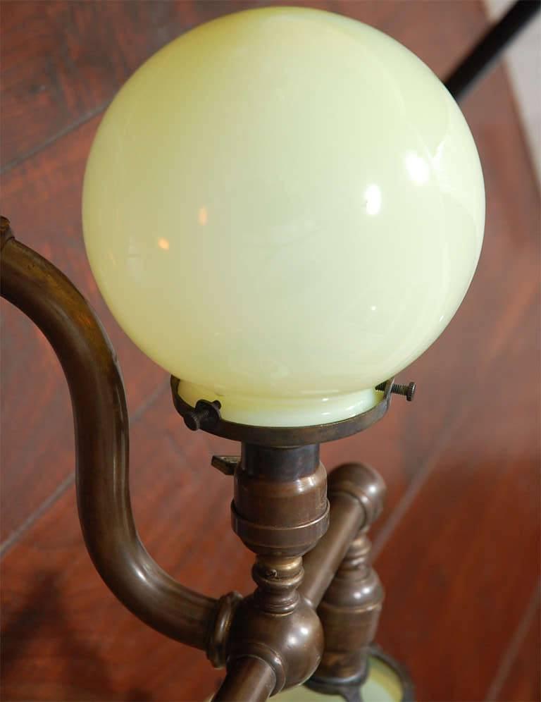 Pair of Aged Brass Sconces with Vaseline Glass Globes 'Triple' For Sale 3