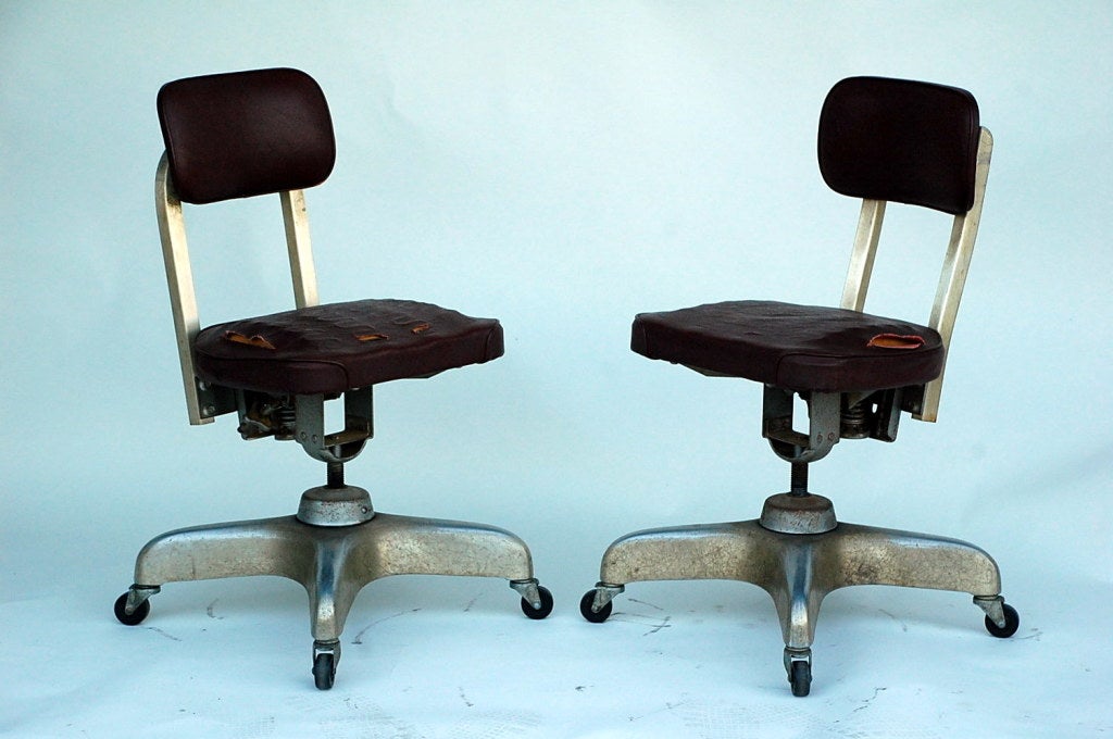 Pair of Aged Industrial Office Swivel Chairs In Excellent Condition For Sale In Los Angeles, CA