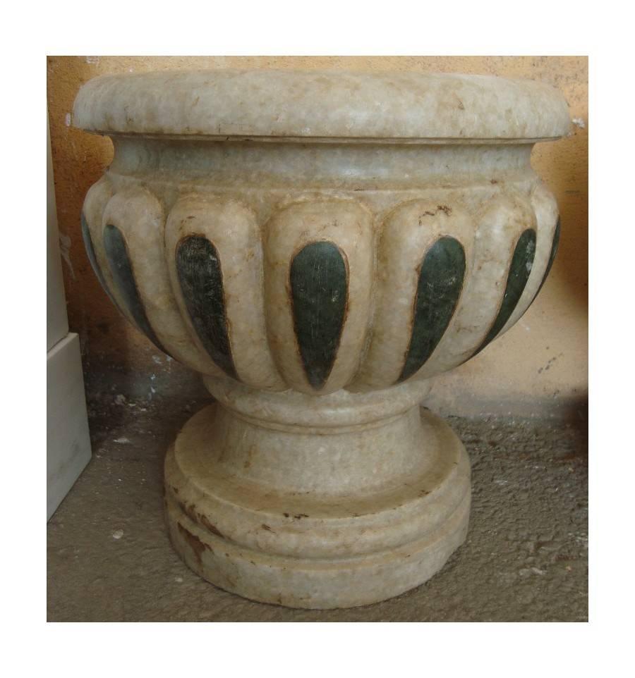 Pair of aged Macael white marble hand-carved planters with serpentine green marble inlays.