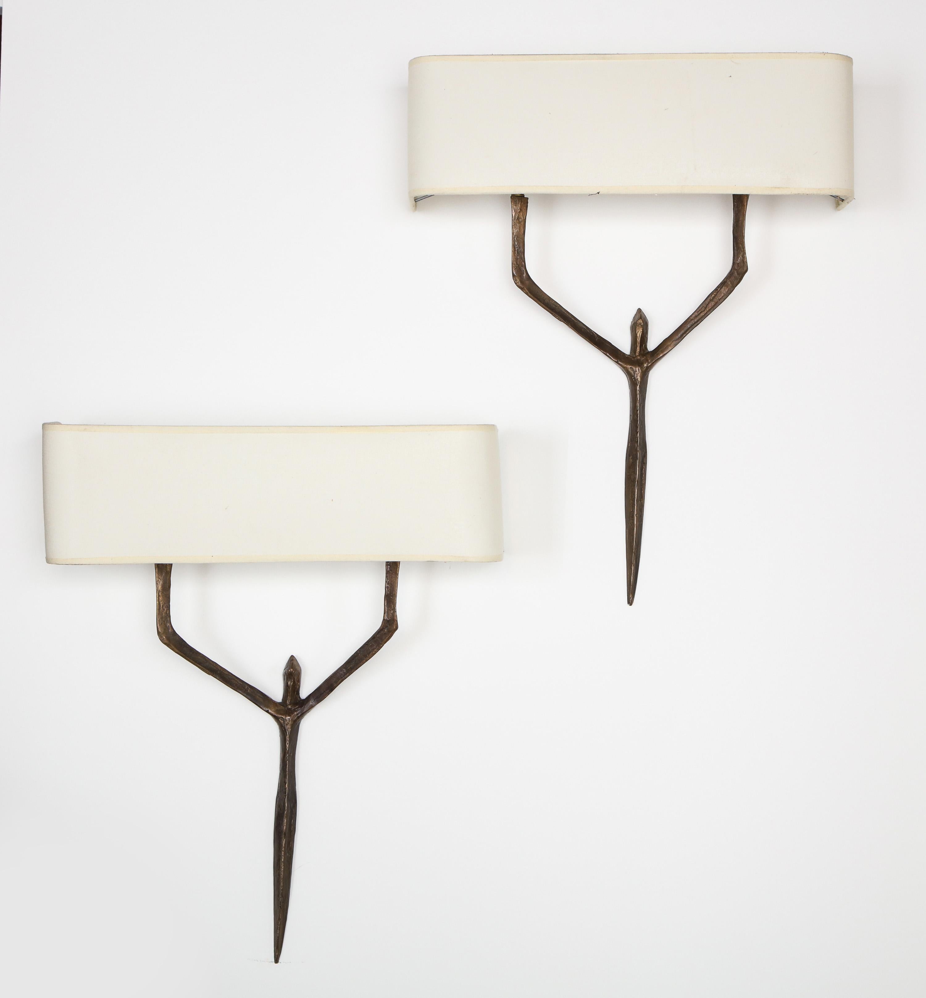 Pair of bronze cariatide sconces by Felix Agostini, France, 1950s.