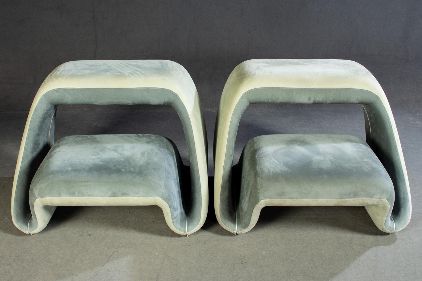 Pair of air sofa/lounge chairs by Fabio Novembre for Meritalia.
Frame of metal, U-shaped, padded with original velvet covers.
Marked with label. Wear and signs of age.
         