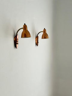 Finland 1950s Paavo Tynell Adjustable Wall Lamps in Patinated Copper & Brass