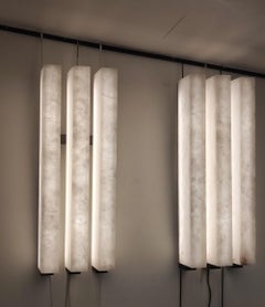 Pair of Alabaster and Black Metal Sconces