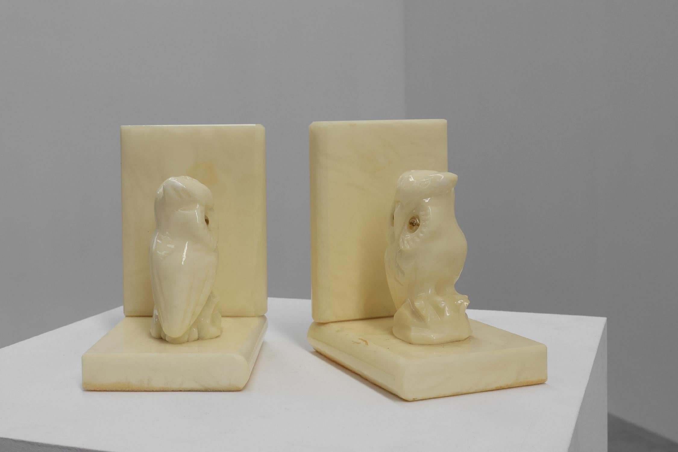 Glass Pair of Alabaster Hand carved bookends in Art Deco style, France 1920s For Sale