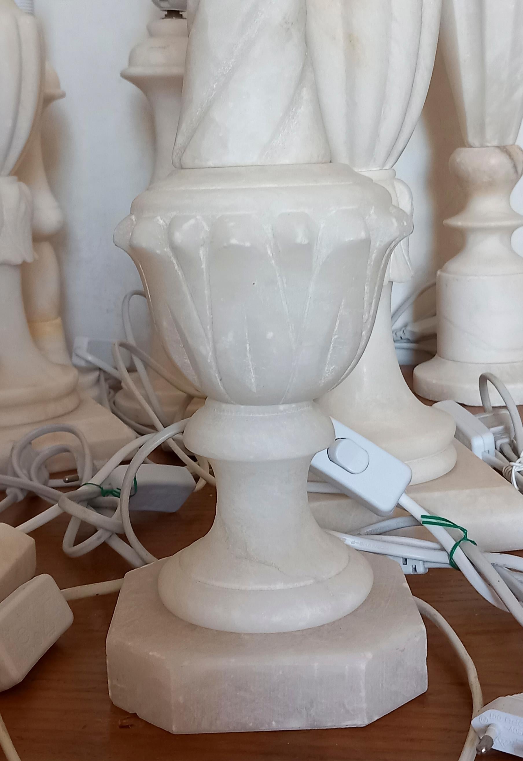 Precious lamps of alabaster or staturium marble(marble used to make sculpture) it is difficult to distinguish
They are tall, stylized and elegant lamps
 They are very well made and are in perfect condition.
Due to their size, these lamps are perfect