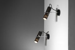 Pair of Alain Richard sconces black lacquered spotlights 50's swivel tubes