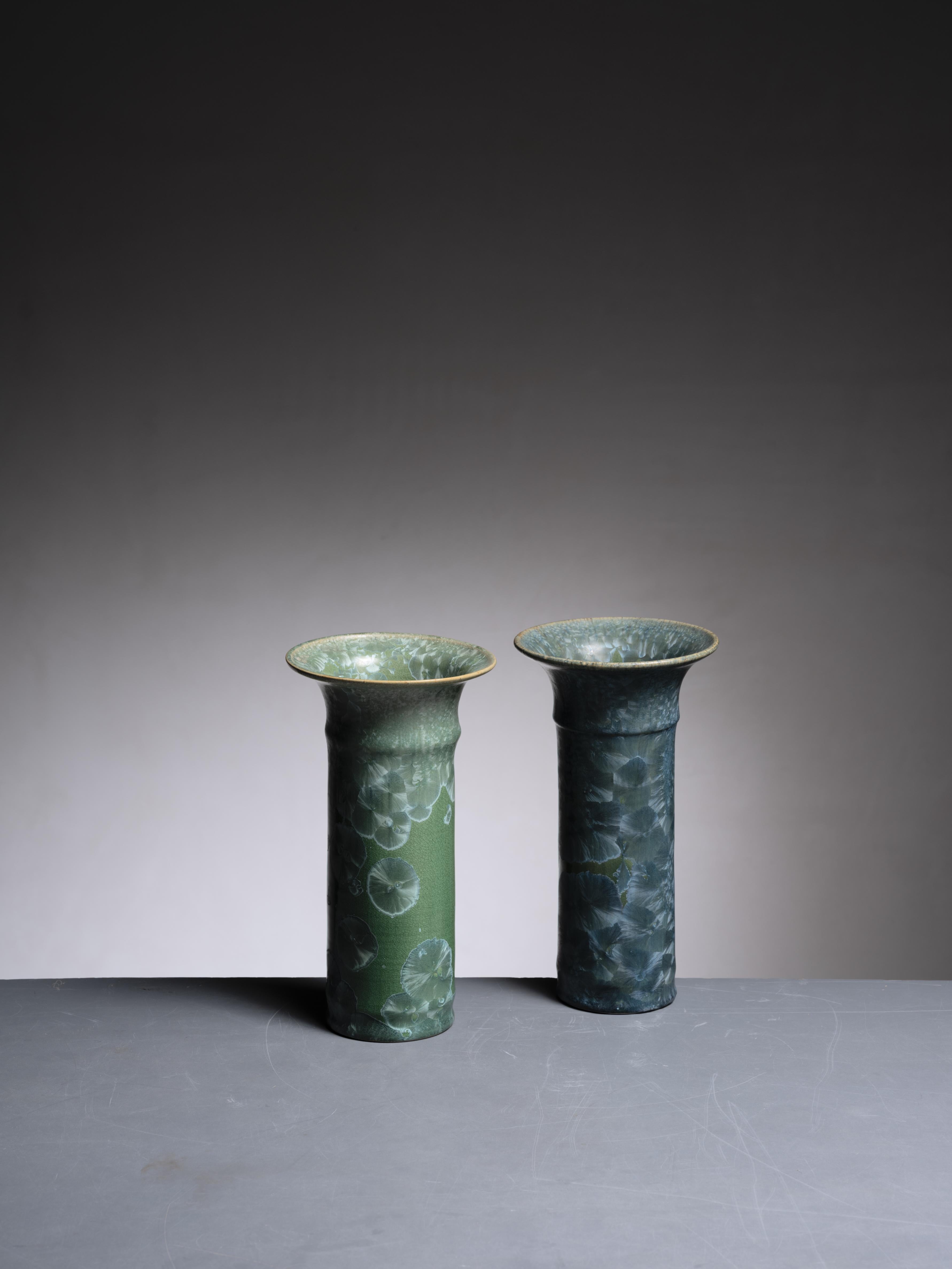 A pair of hand-thrown ceramic vases with a green crystalline glazing by Albert Kiessling for his Töpferei Kiessling in Langhessen, Germany. Marked by Kiessling and in an excellent condition.