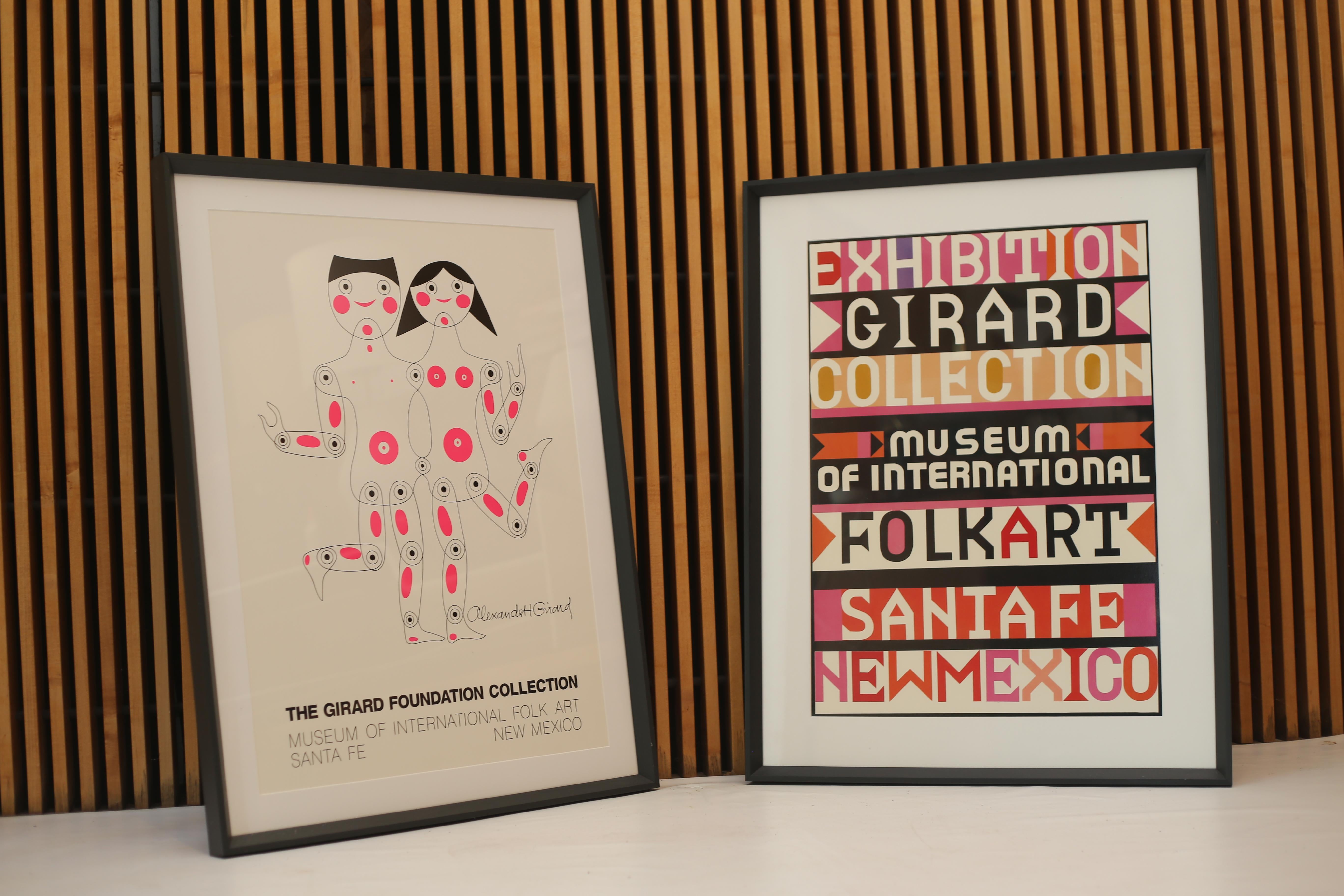 Custom framed new old stock Alexander Girard Exhibition posters from exhibitions in Sante Fe New Mexico, with vibrant pinks and orange colors. 

The posters are custom matted so the frames are the same size. 

Dimensions of frame:
35