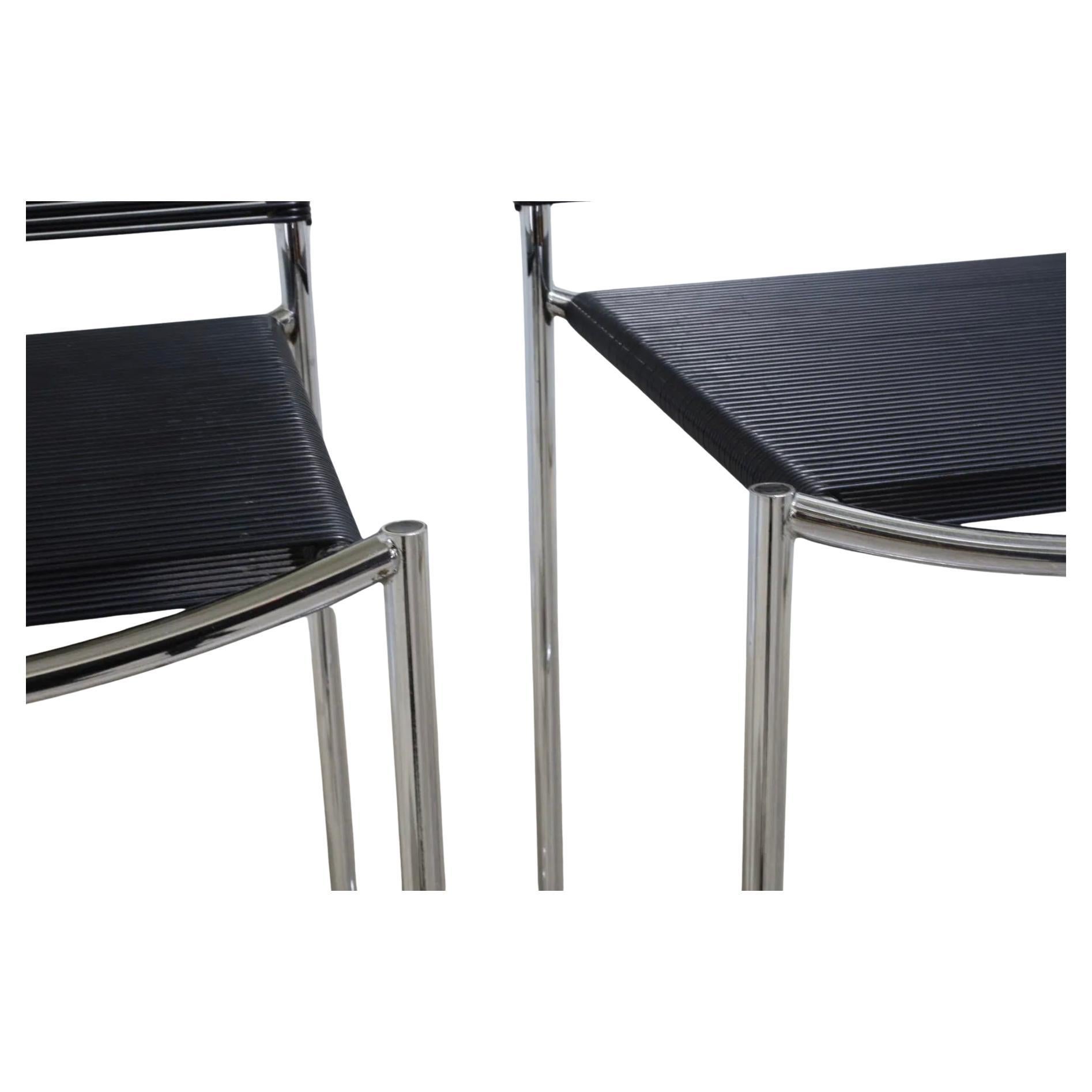 Paire de tabourets spaghetti Alias Italy en chrome noir par Giandomenico Belotti. Assise et dossier en caoutchouc noir tressé avec un cadre en tube chromé. Fabriqué en Italie vers 1980. Situé à Brooklyn NYC ou Kingston NY.

Design/One -Giandomenico