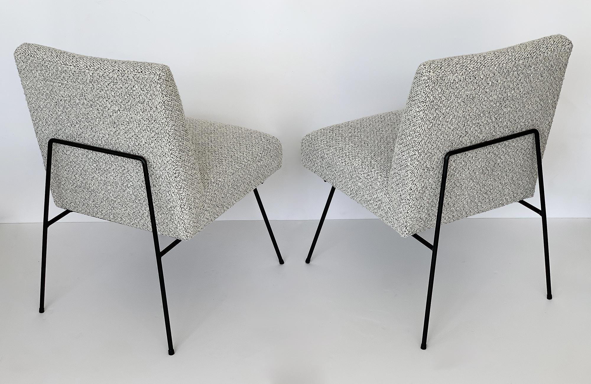 Pair of Allan Gould style iron frame armless slipper lounge chairs, circa 1950s. Unique design along the back where the legs create a U-shape that sits slightly away and half way up the back. Newly upholstered in a Kelly Wearstler highly textural