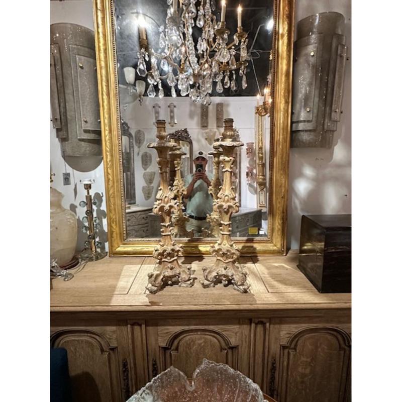 Pair of 19th century Italian carved and giltwood alter sticks. Circa 1870. A timeless and classic touch for a fine interior.