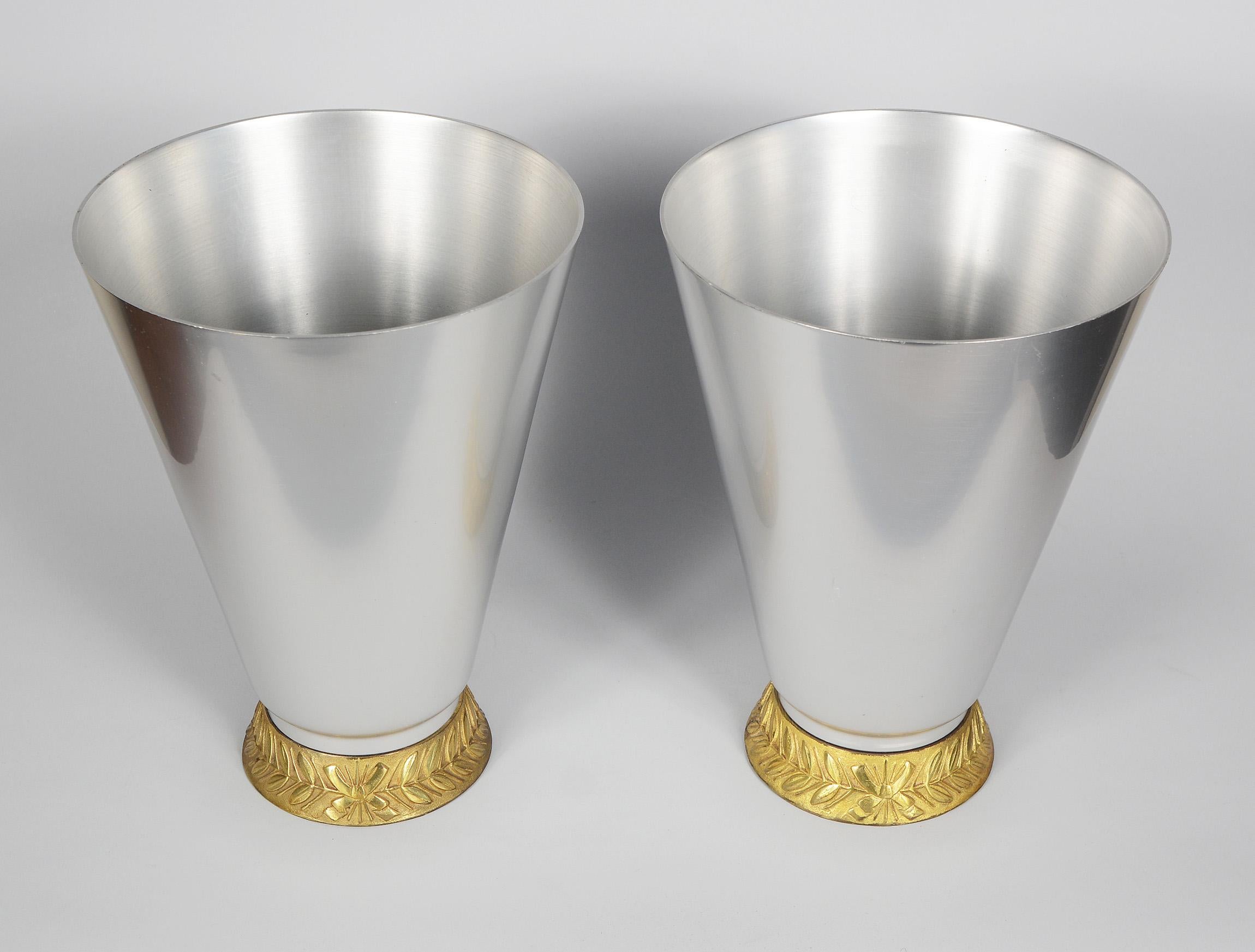 Pair of Marlborough vases designed by Lurelle Guild in 1934 for Kensington Inc. The Kensington Ware line was introduced in 1934 by Alcoa as aluminum alloy giftware and domestic items. It was marketed as having the same advantages of silver, pewter
