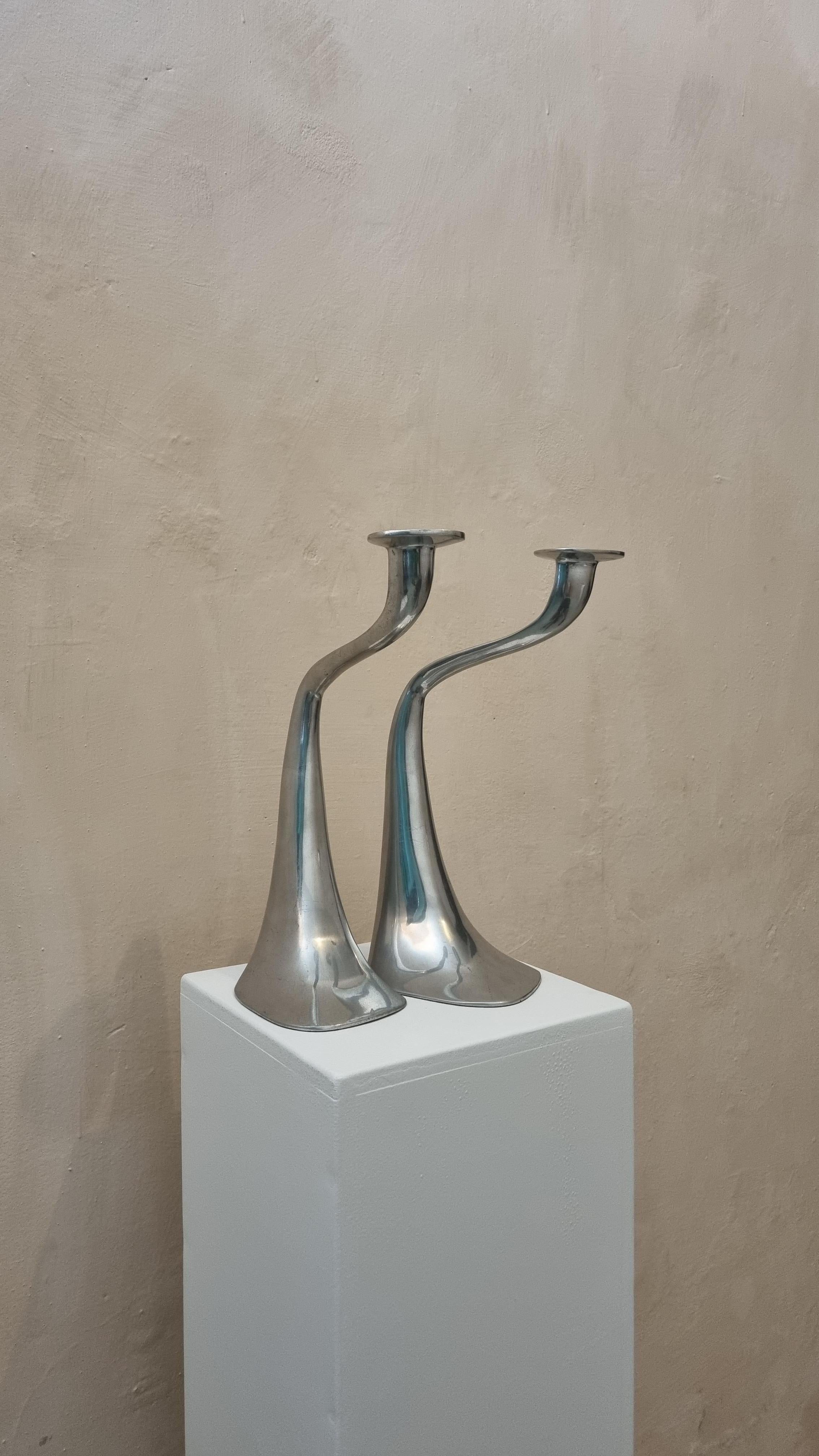 Pair of aluminum candlesticks mod. Turner by Xavier Lust produced by Driade, 90s.
Turner by Xavier Lust is an object with a strong aesthetic impact, which allows you to create numerous decorative variations. These chandeliers made of cast polished