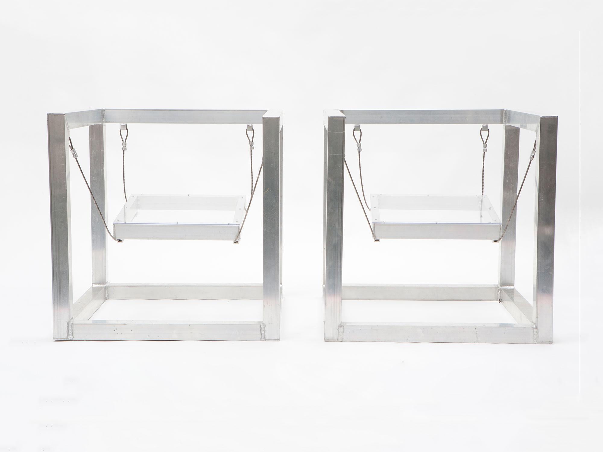 Pair of aluminum and plexiglass armchairs by RO/LU with hanging seats. Created during RO/LU's residency at the Rauschenberg Foundation, and made by one of Rauschenberg's original fabricators. This pair is unique.