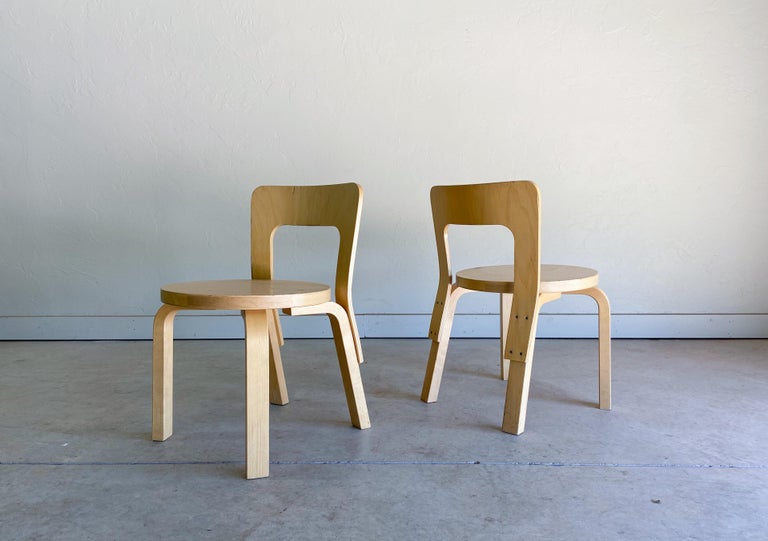 Offered is a set of newer production N65 children's chairs designed by famed architect and designer Alvar Aalto and produced by Artek. 

Easily one of Aalto's most recognized and celebrated designs. A great example of form and function. Made from