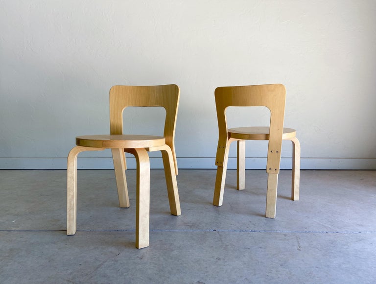 Offered is a set of newer production N65 children's chairs designed by famed architect and designer Alvar Aalto and produced by Artek. 

Easily one of Aalto's most recognized and celebrated designs. A great example of form and function. Made from