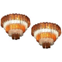 Paire de lustres ou de chandeliers en verre de Murano de couleur ambre et glace:: 1970