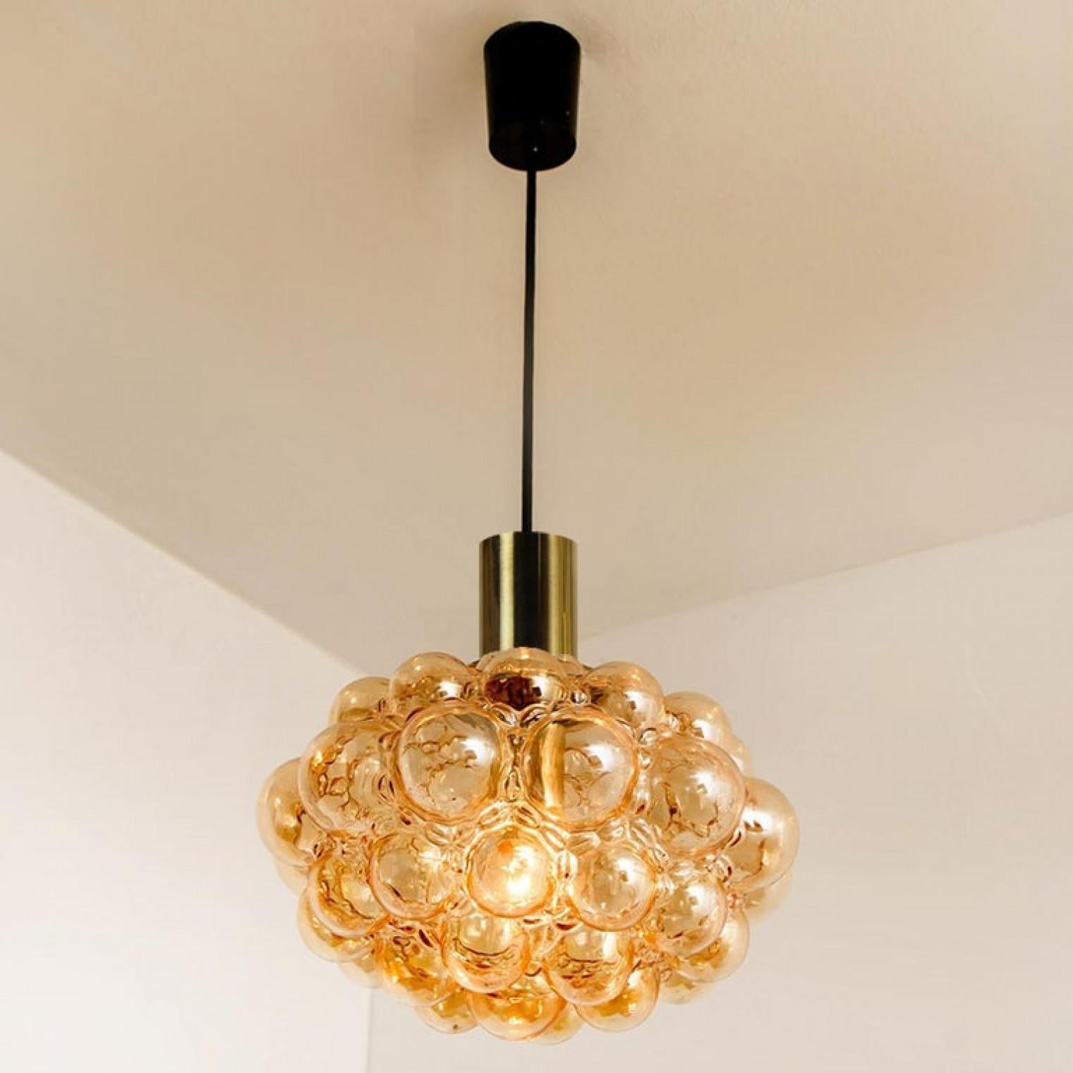 Pair of Amber Bubble Glass Pendant Lamps by Helena Tynell, 1960 In Good Condition In Rijssen, NL