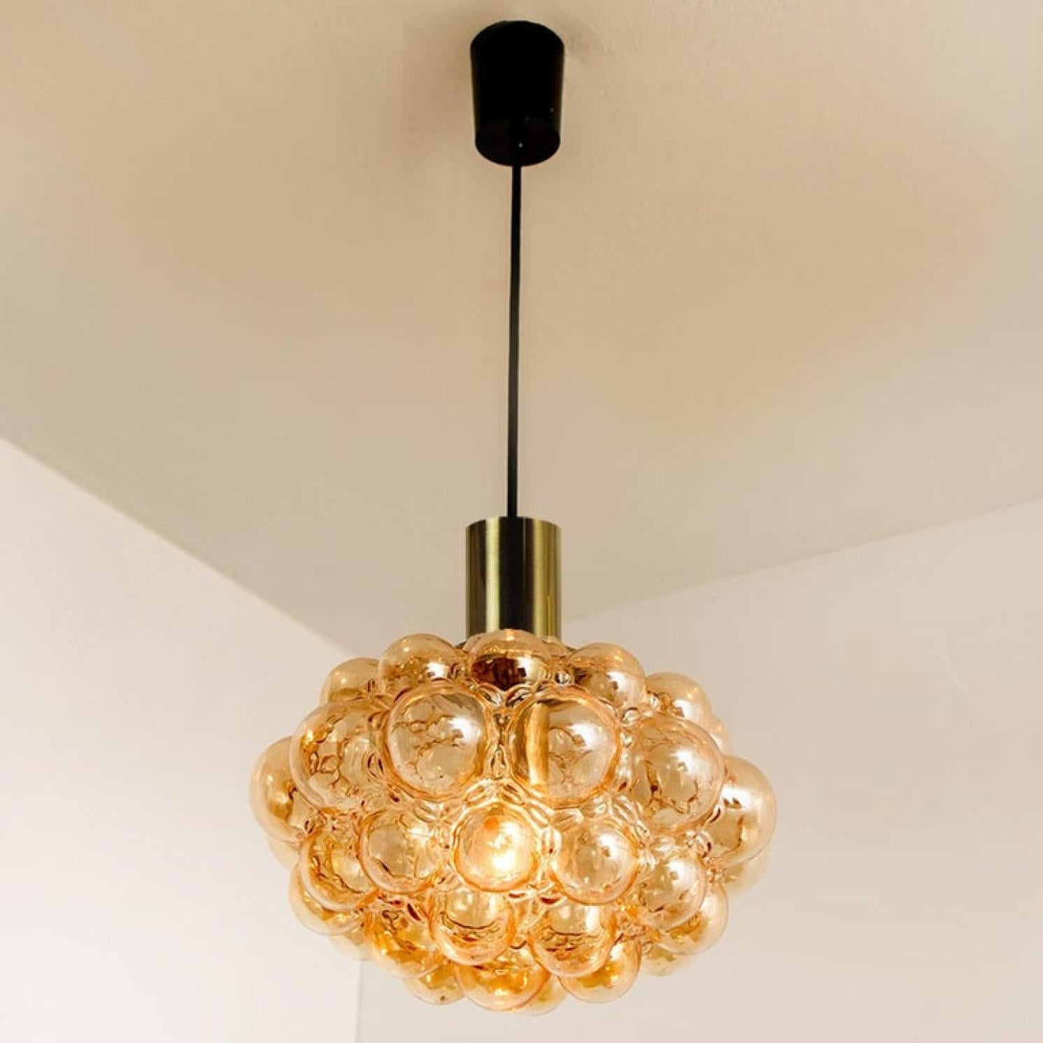Mid-20th Century Pair of Amber Bubble Glass Pendant Lamps by Helena Tynell, 1960