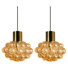 Retro Pair of Amber Bubble Glass Pendant Lamps by Helena Tynell, 1960