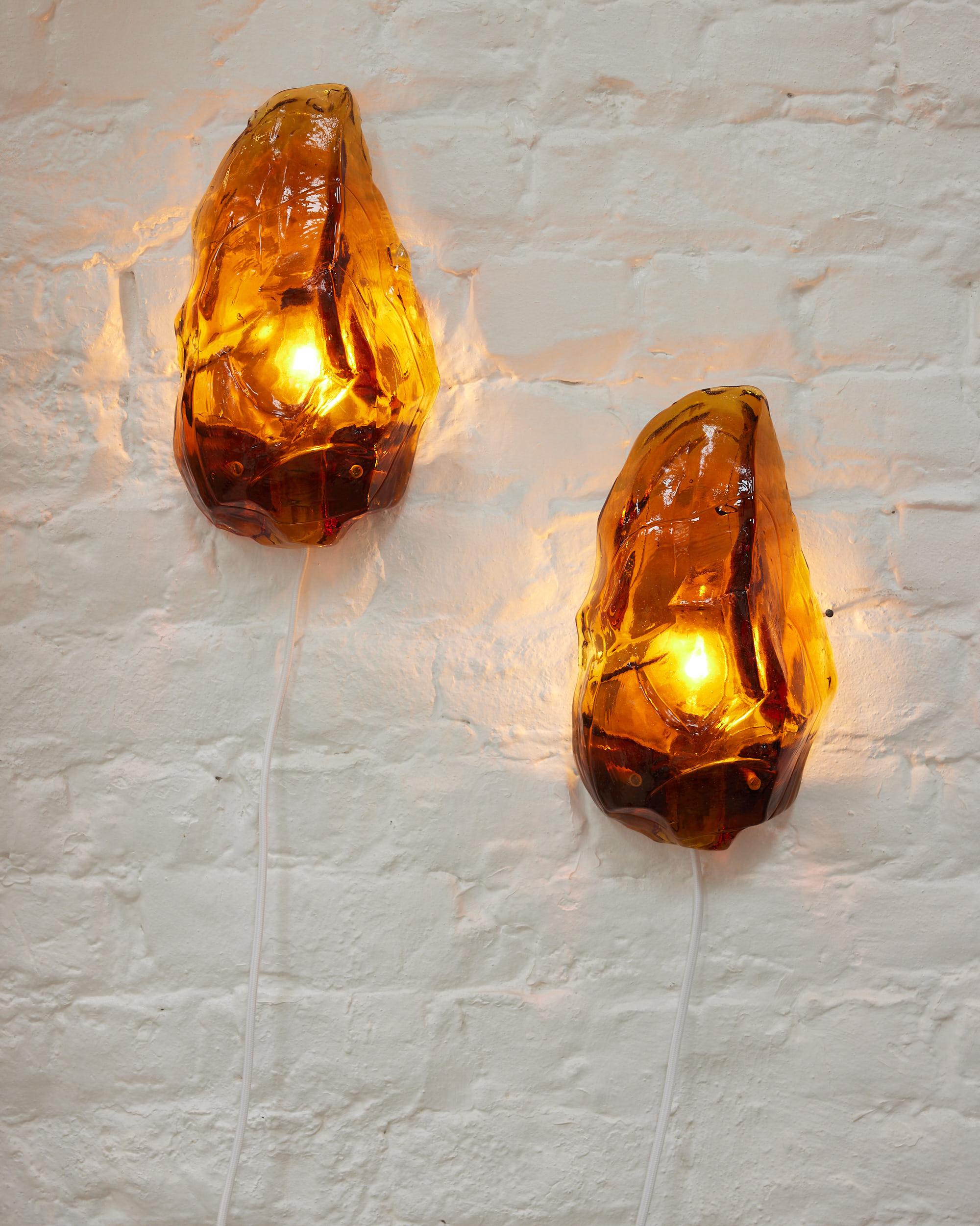 French Pair of amber glass wall lamps
