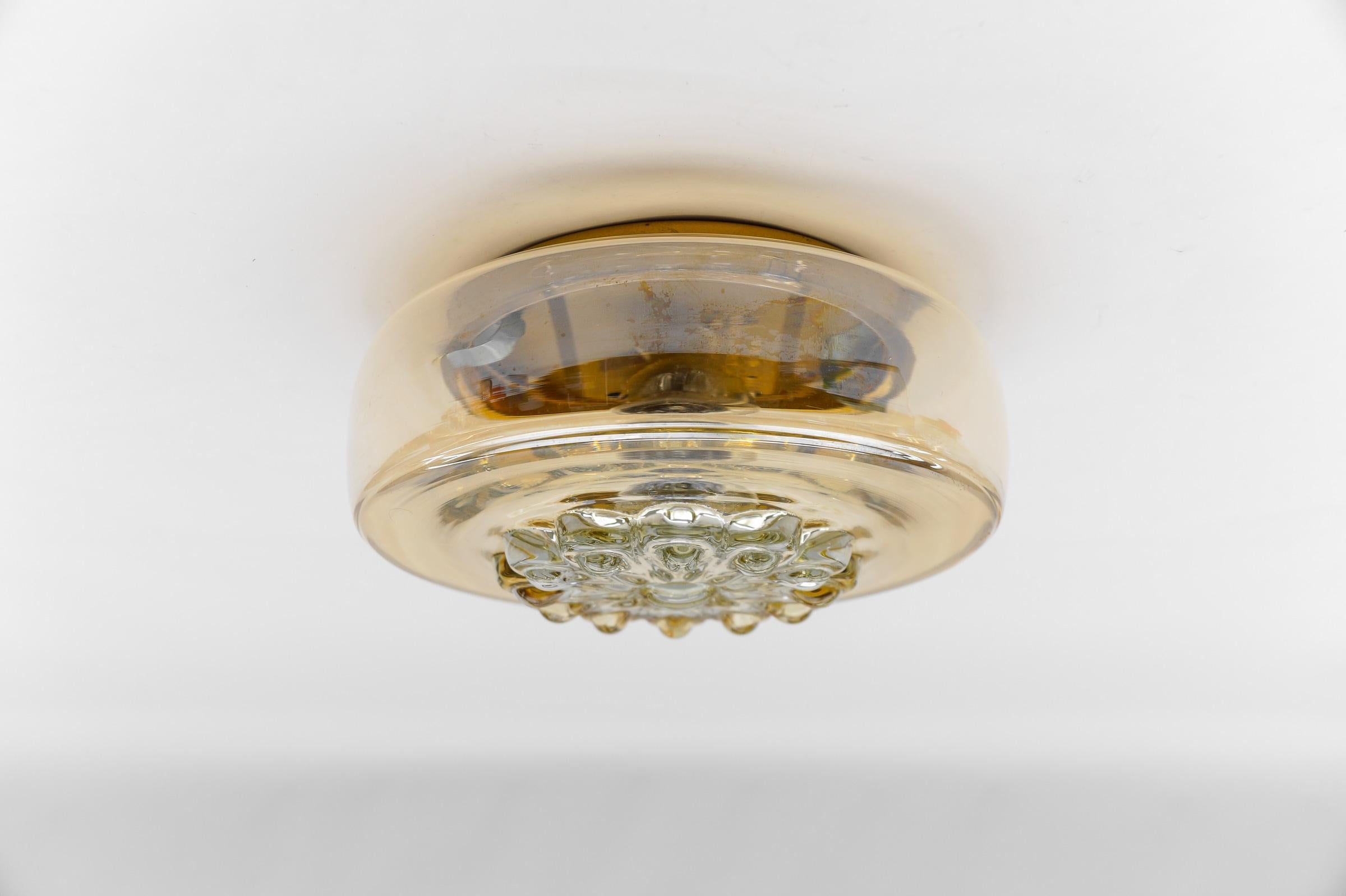 Pair of Amber Gold Wall Lamps / Flush Mount Lights, 1960s

Each fixture need 1 x E27 standard bulb.

Light bulbs are not included.

It is possible to install this fixture in all countries (US, Australia, Asia, UK, Europe,..)