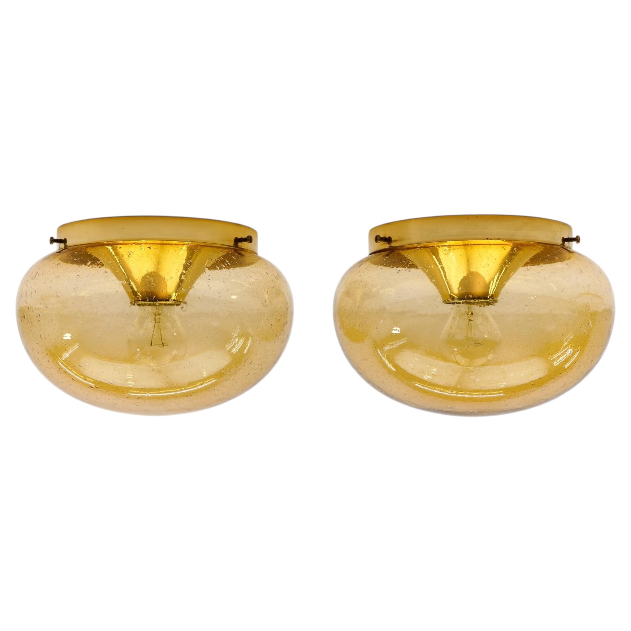Pair of amber gold with air bubble inclus wall lamps / flush mount Lights, 1960s