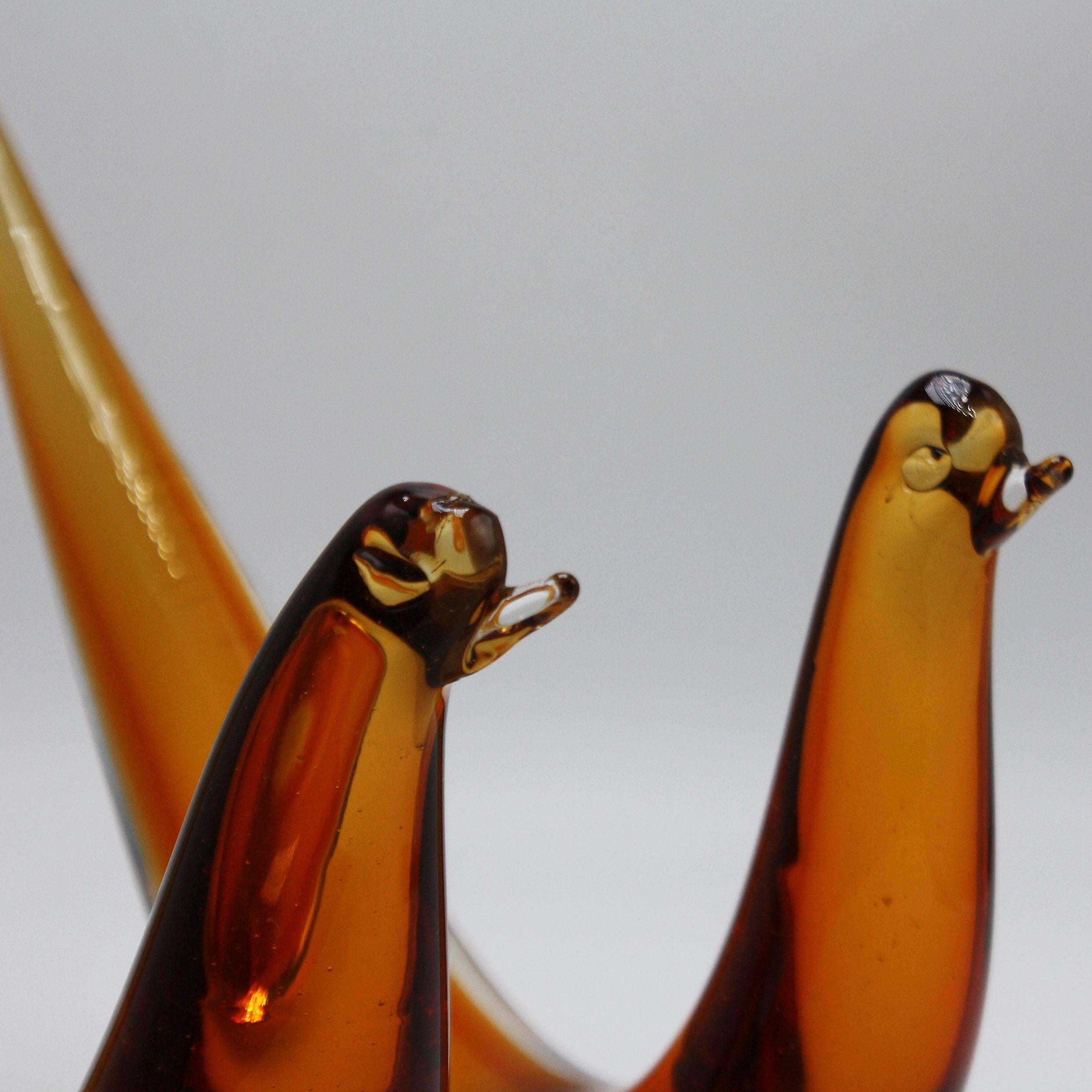 Pair of amber Murano glass abstract birds, circa 1960
$625.