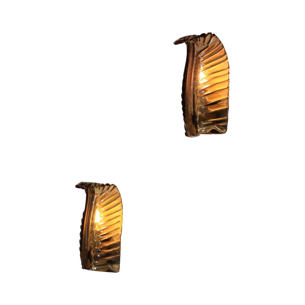 Coppia di applique in vetro di Murano color ambra degli anni 
50 di Venini in vendita