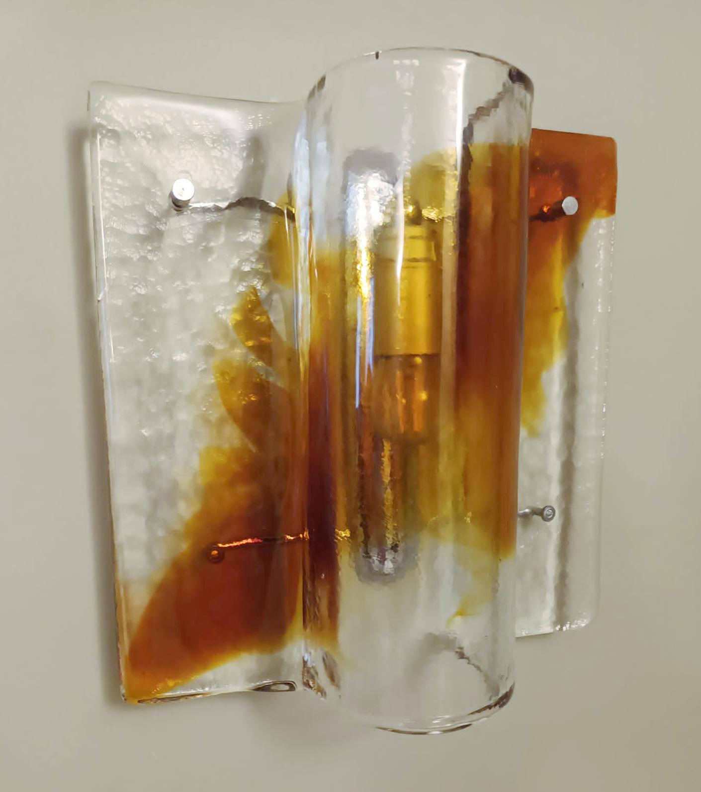 Pair of Italian wall lights with clear and amber Murano glass shades mounted on chrome brackets / Made in Italy by Mazzega, circa 1960s
1 light / E12 or E14 type / max 40W
Measures: Height 12 inches, width 11.5 inches, depth 5 inches
1 pair