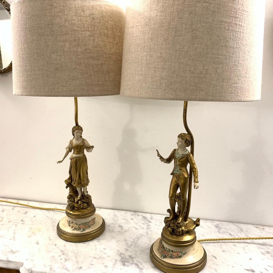 Good decorative pair of painted and gilded spelter lamps by L&F Moreau of the USA for the 
