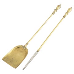 Pair of American Academic Revival brass fire tools, c. 1950