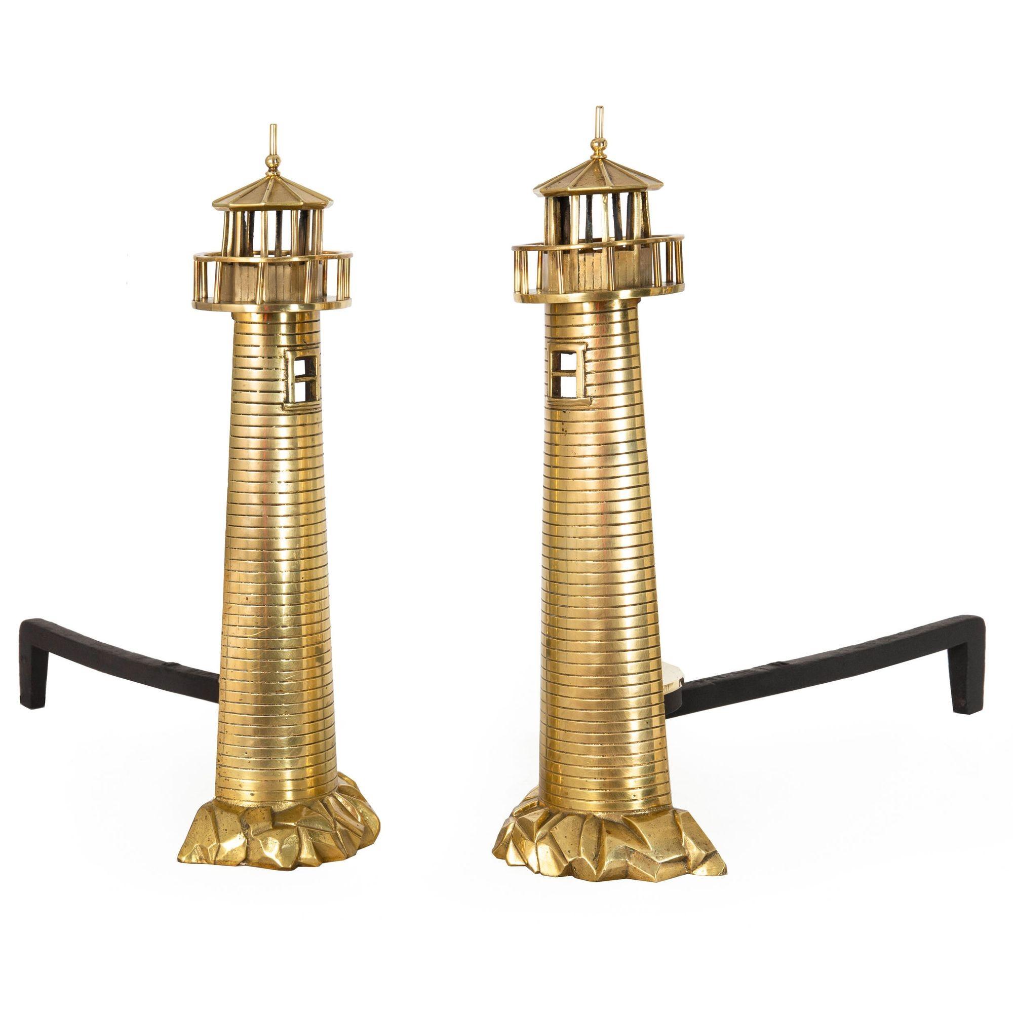 UNUSUAL PAIR OF LIGHTHOUSE-FORM BRASS LOG STOP ANDIRONS
By Rostand Manufacturing Company of Milford, Connecticut  made circa early 20th century  marked on log hogs 