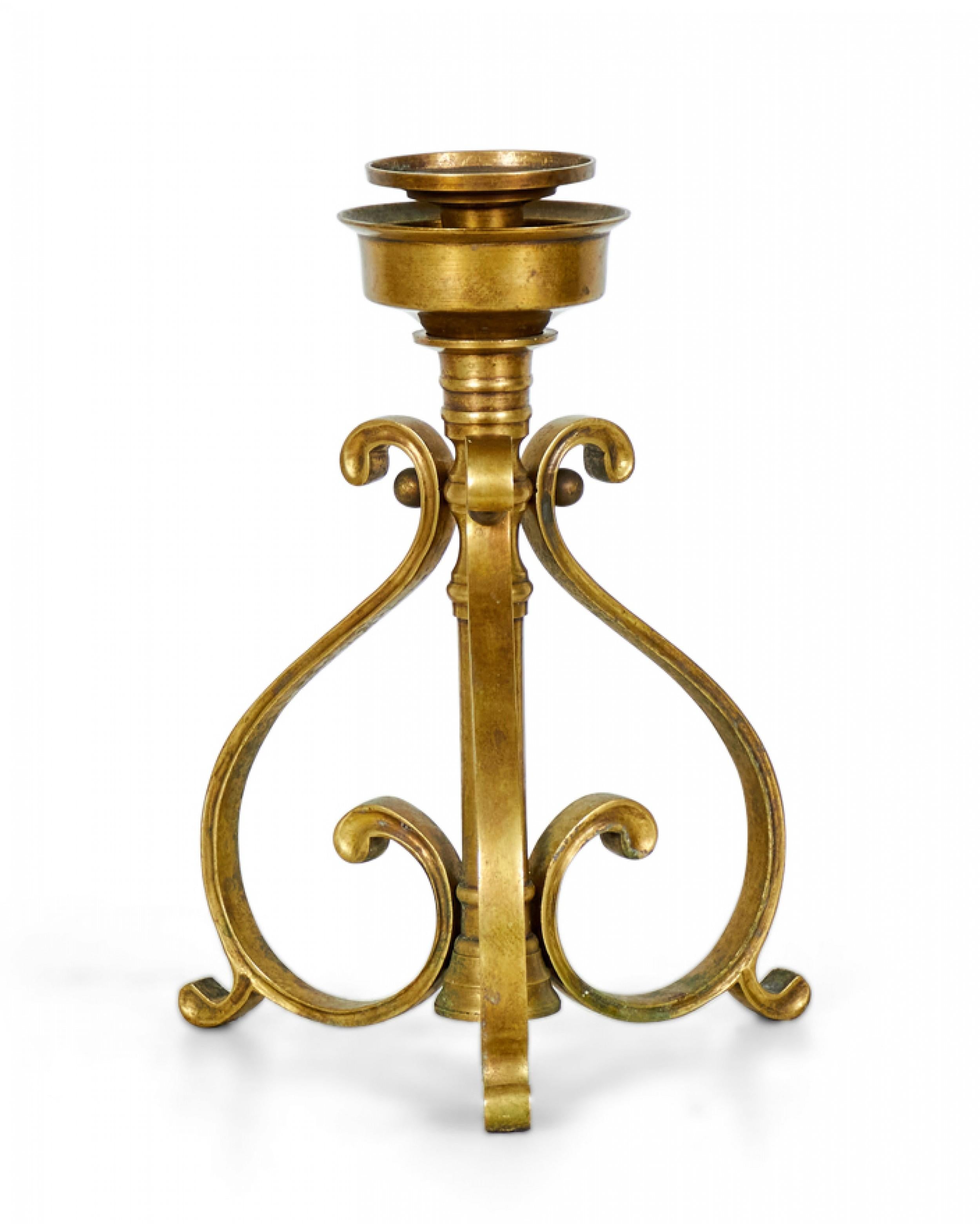 PAIR of American Art Deco-style bronze candlesticks with three scroll design legs supporting a central pillar topped with a holder for a single taper candle. (PRICED AS PAIR)