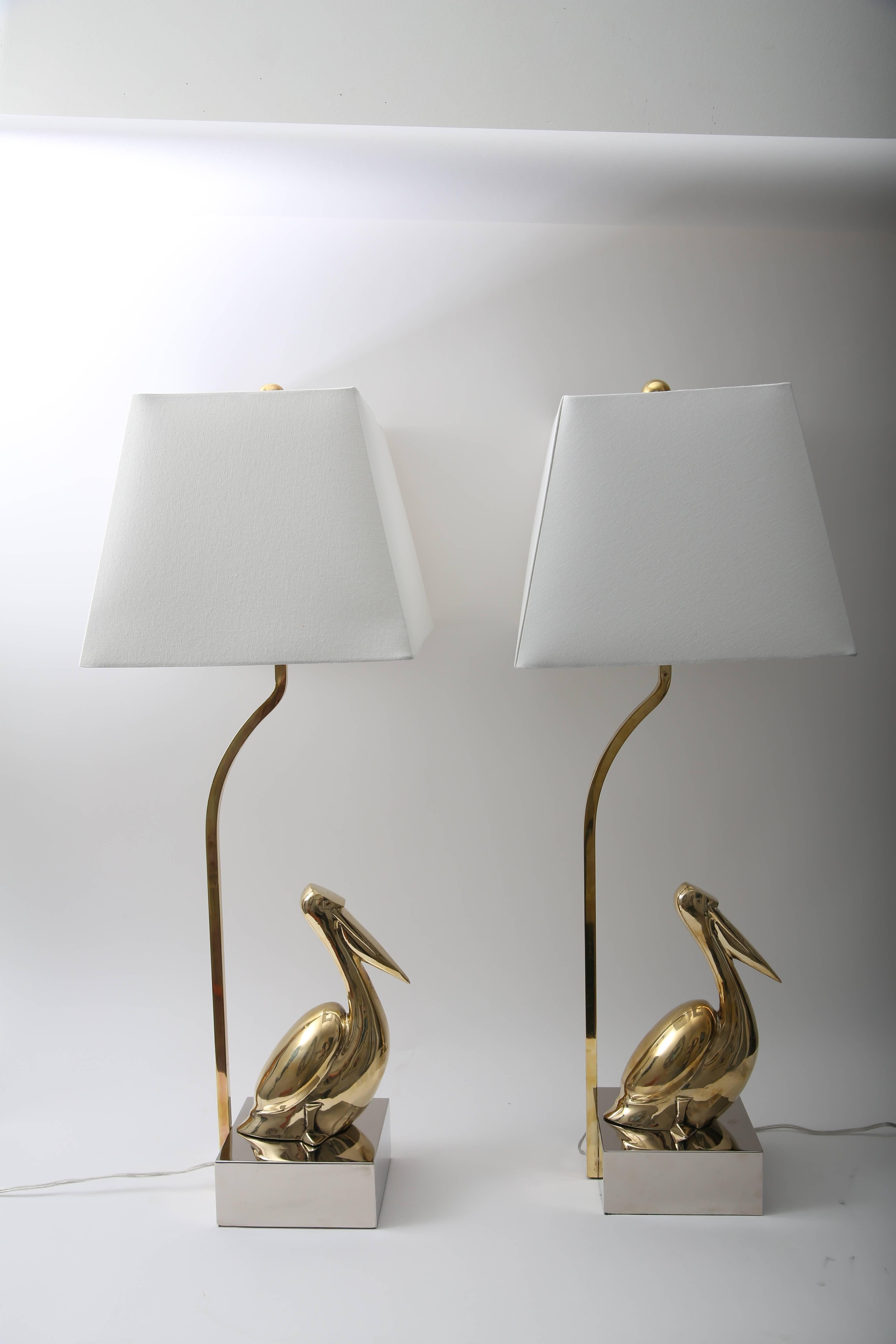 Polished Pair of American Art Deco Style Table Lamps with Stylized Figural Pelicans