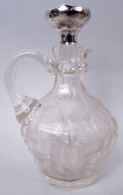 Coppia di caraffe in argento sterling e vetro intagliato in stile Art Nouveau americano