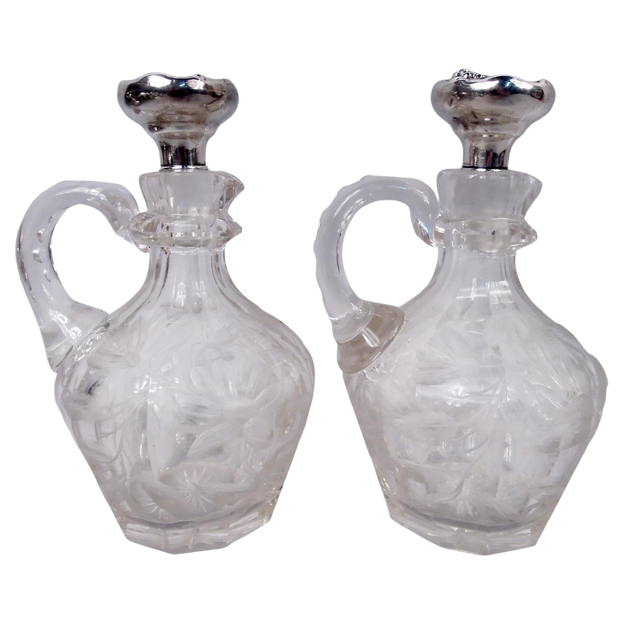 Pair of American Art Nouveau Sterling Silver & Cut Glass Decanters