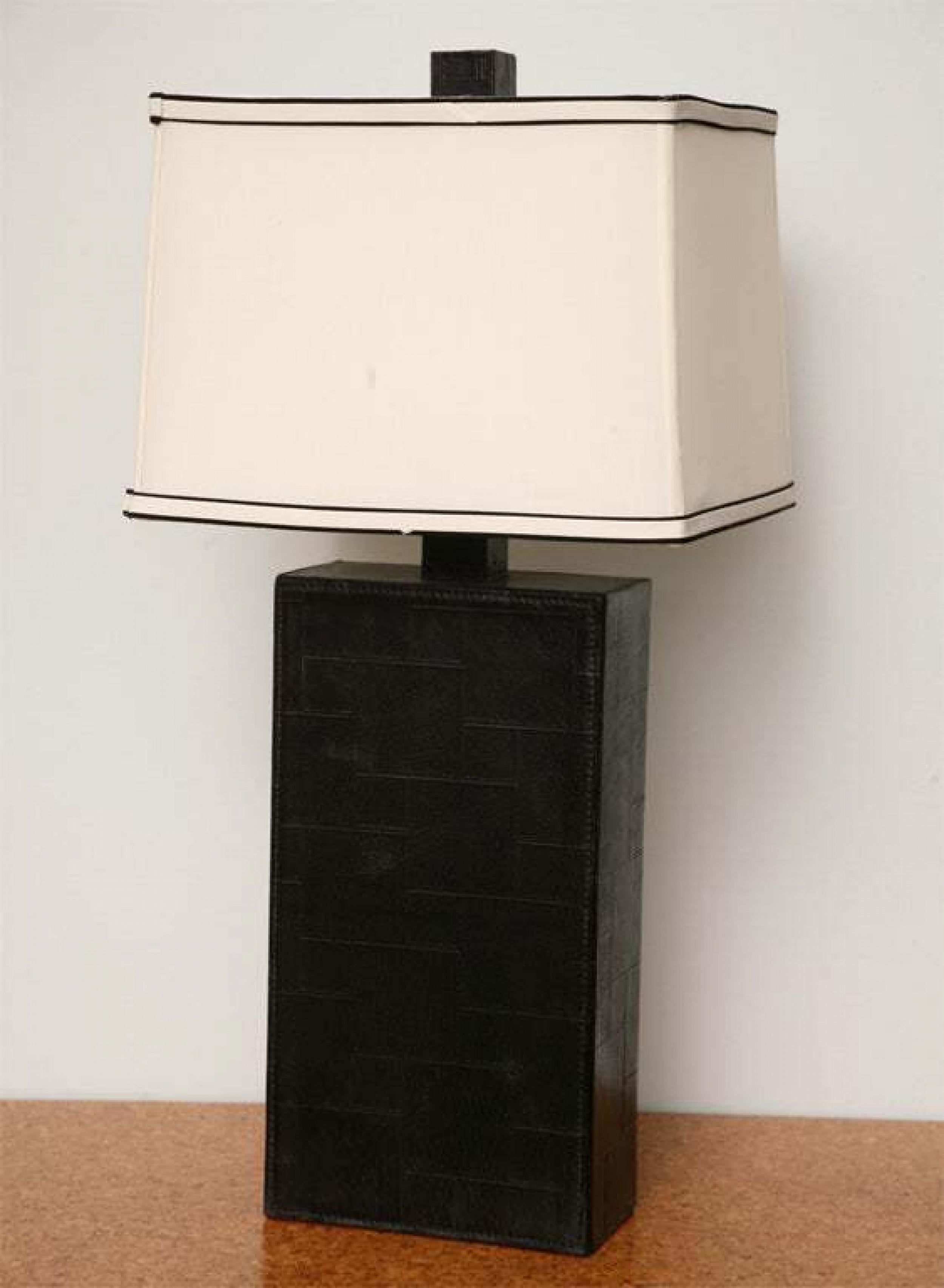 PAIR of midcentury American black leather table lamps (in the Style of Jacques Adnet) (PRICED AS PAIR).