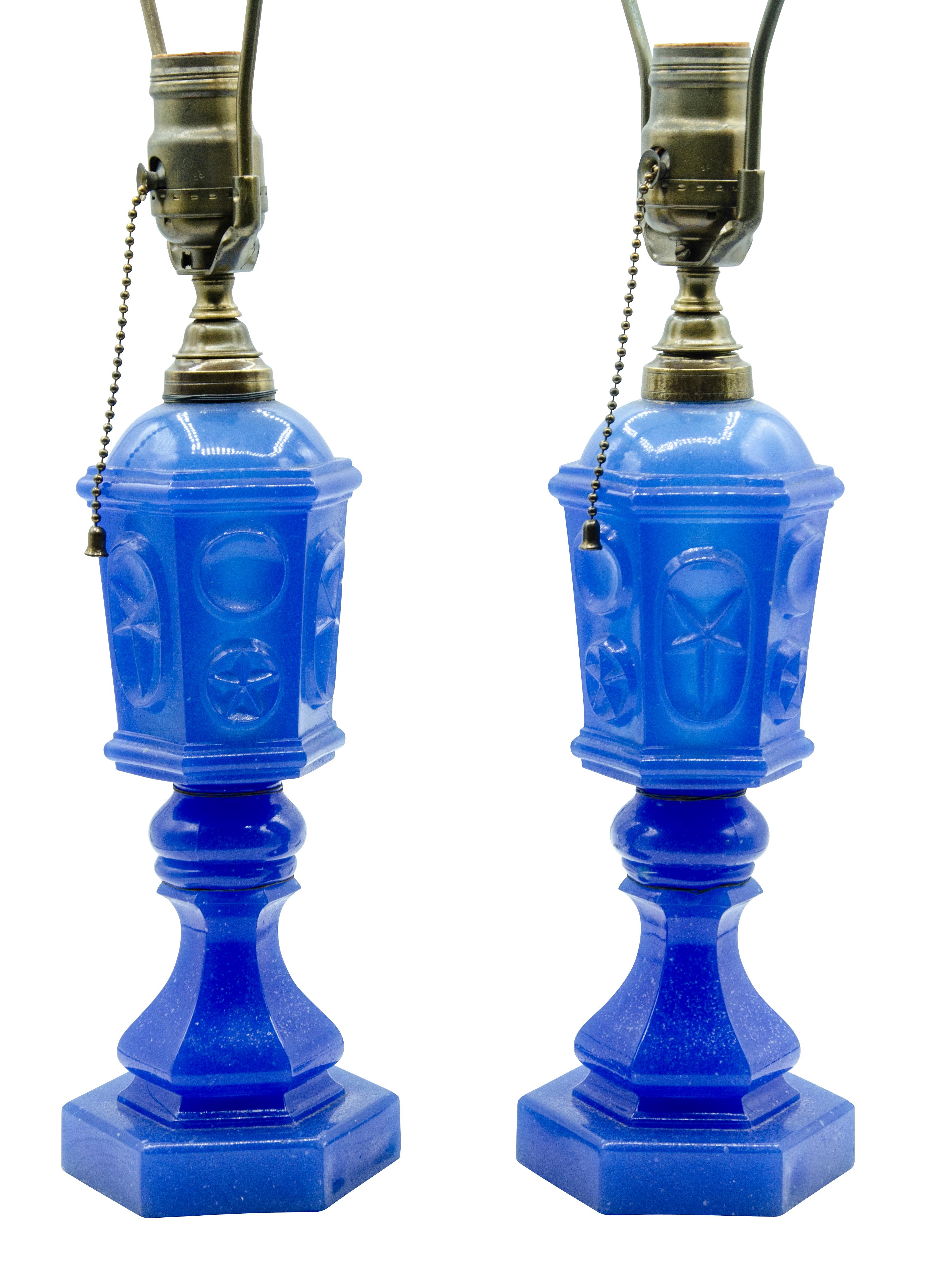 Great color and likely made by a Boston glass company. The whale oil or other would fill lamp and would have had a wick on top. Now itted for electricity.