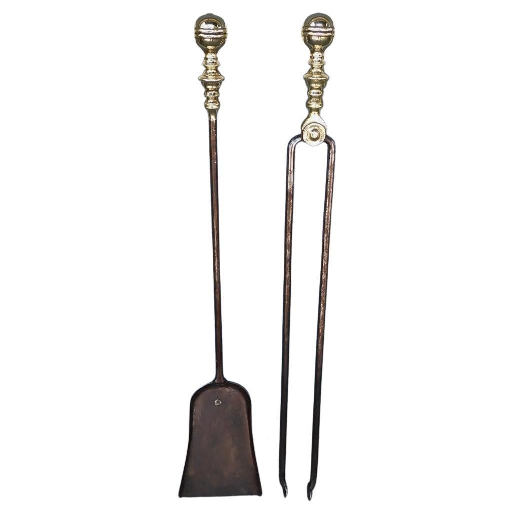 Pair of American Brass and Polished Steel Ball Finial Banded Fire Tools, C 1810