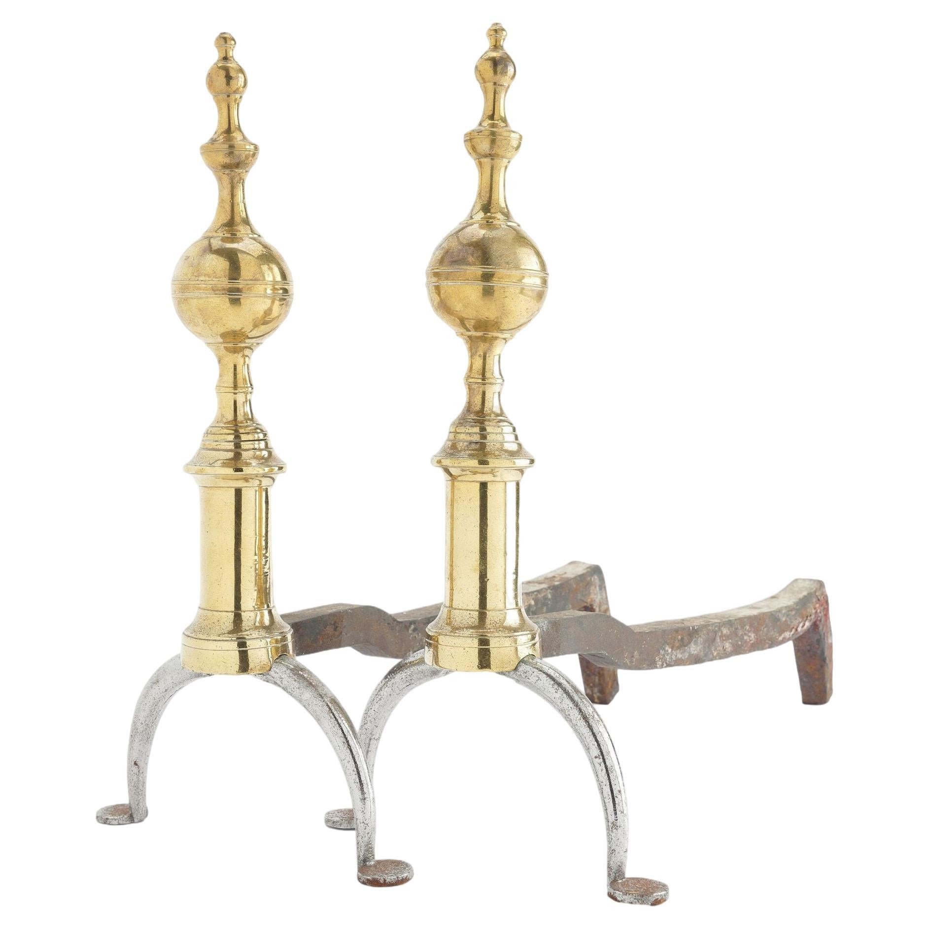 Pair of American cast brass and forged iron steeple top andirons, 1812-15 For Sale