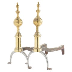 Pair of American cast brass and forged iron steeple top andirons, 1812-15