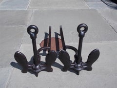 Pair of American Cast Iron Anchor Andirons with Circular Ringed Columns. C. 1870