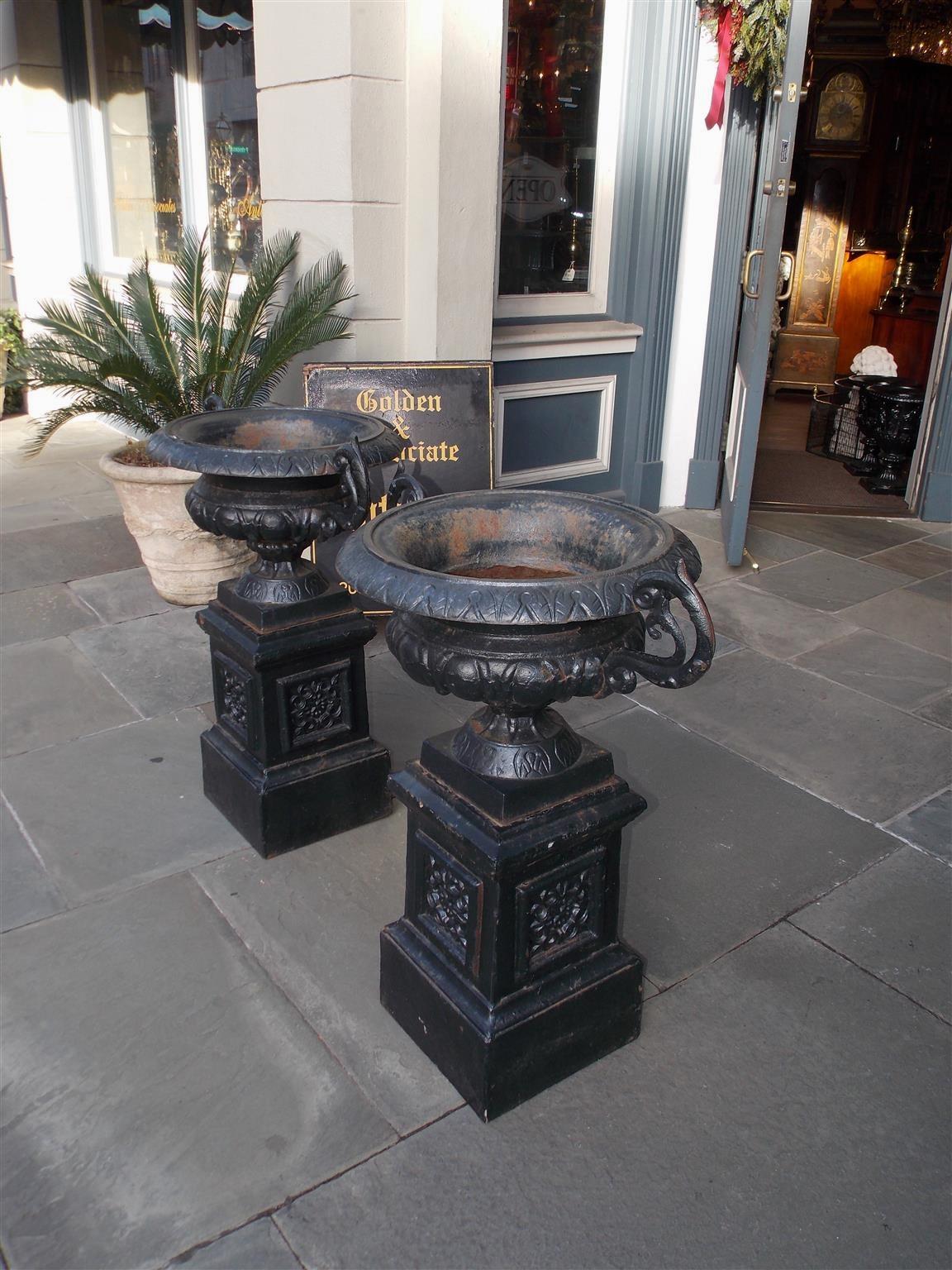 Late 19th Century Pair of American Cast Iron Campana-Form Floral Garden Urns on Plinths Circa 1880 For Sale