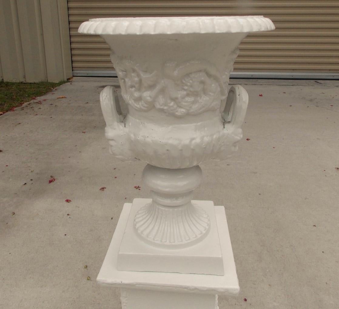 Pair of Cast Iron Floral Campana Garden Urns on Squared Plinths, Circa 1890 In Excellent Condition In Hollywood, SC