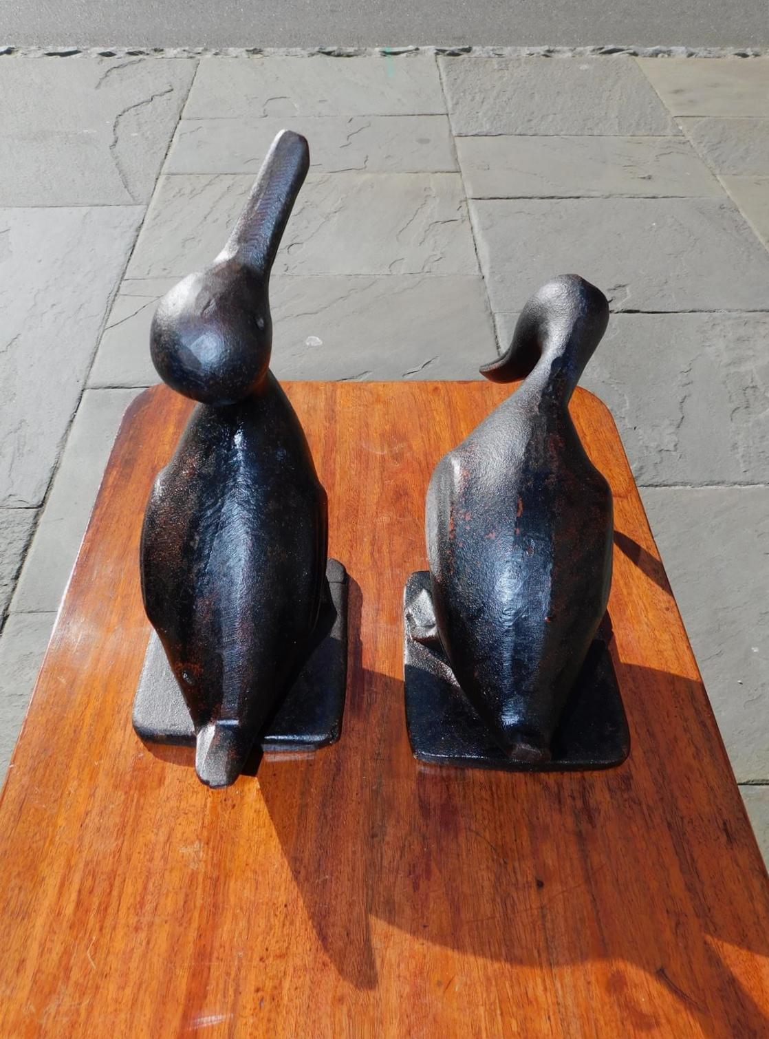 Folk Art Pair of American Cast Iron Hand Painted Preening Ducks on Squared Base, C 1880 For Sale