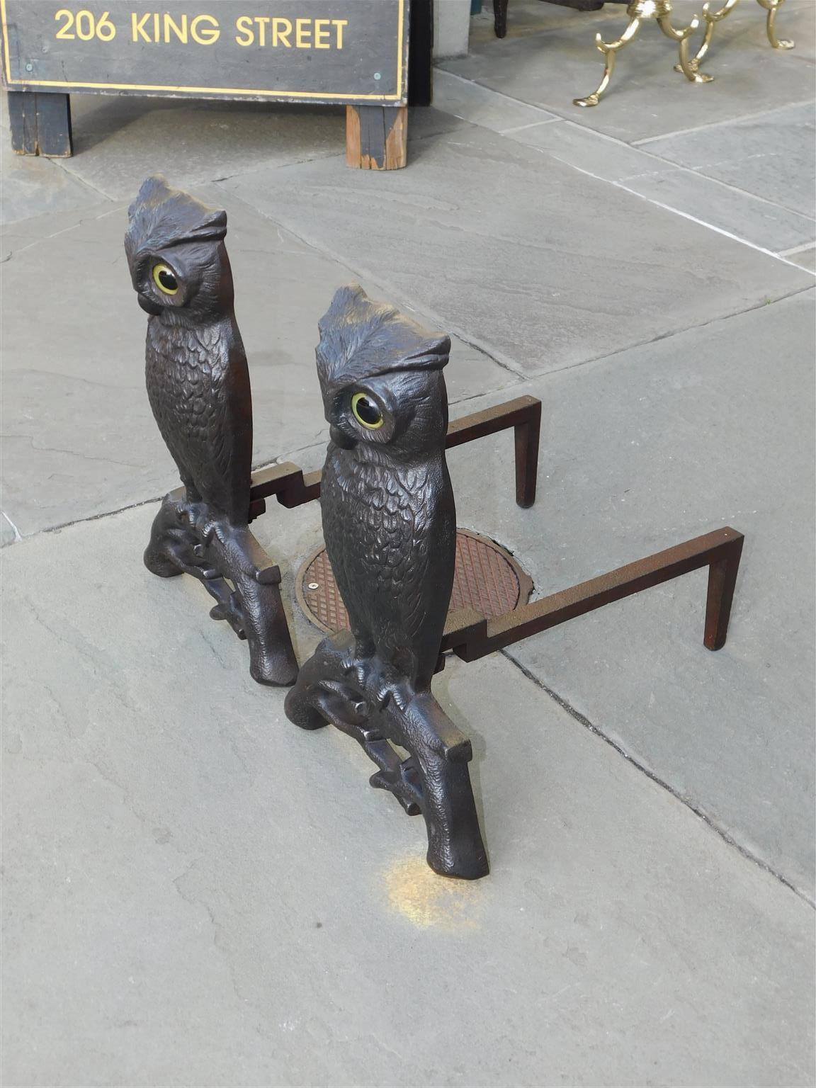 cat andirons with glass eyes