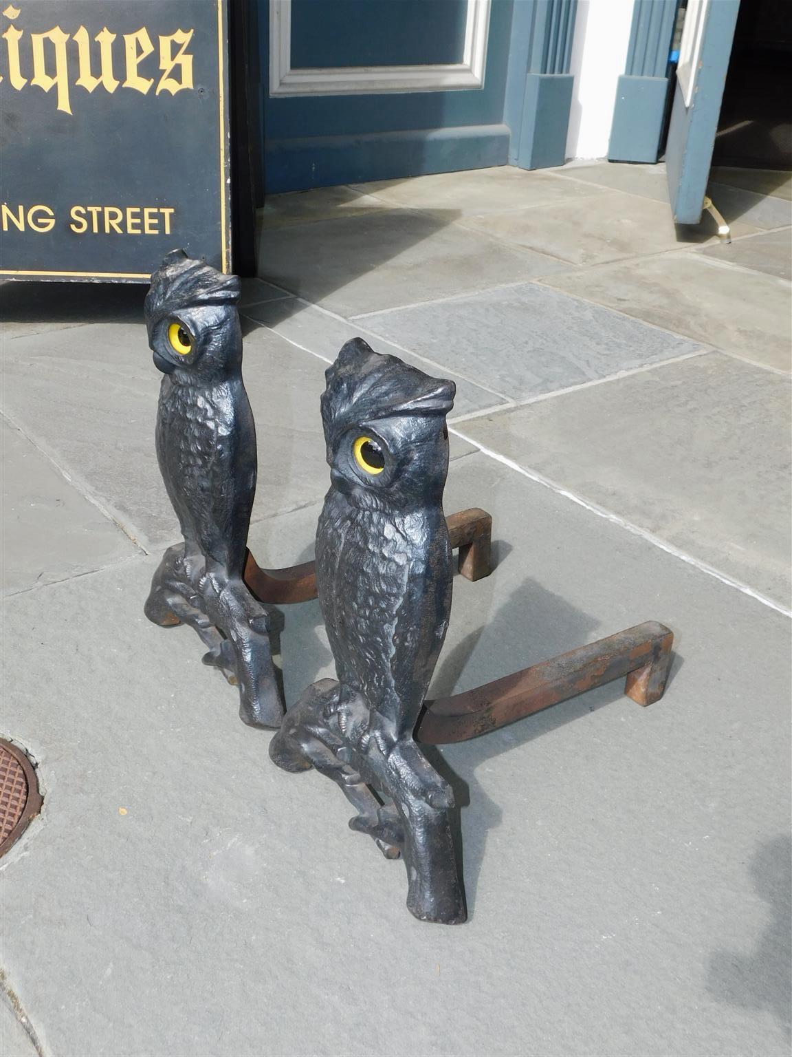 owl andirons with glowing eyes