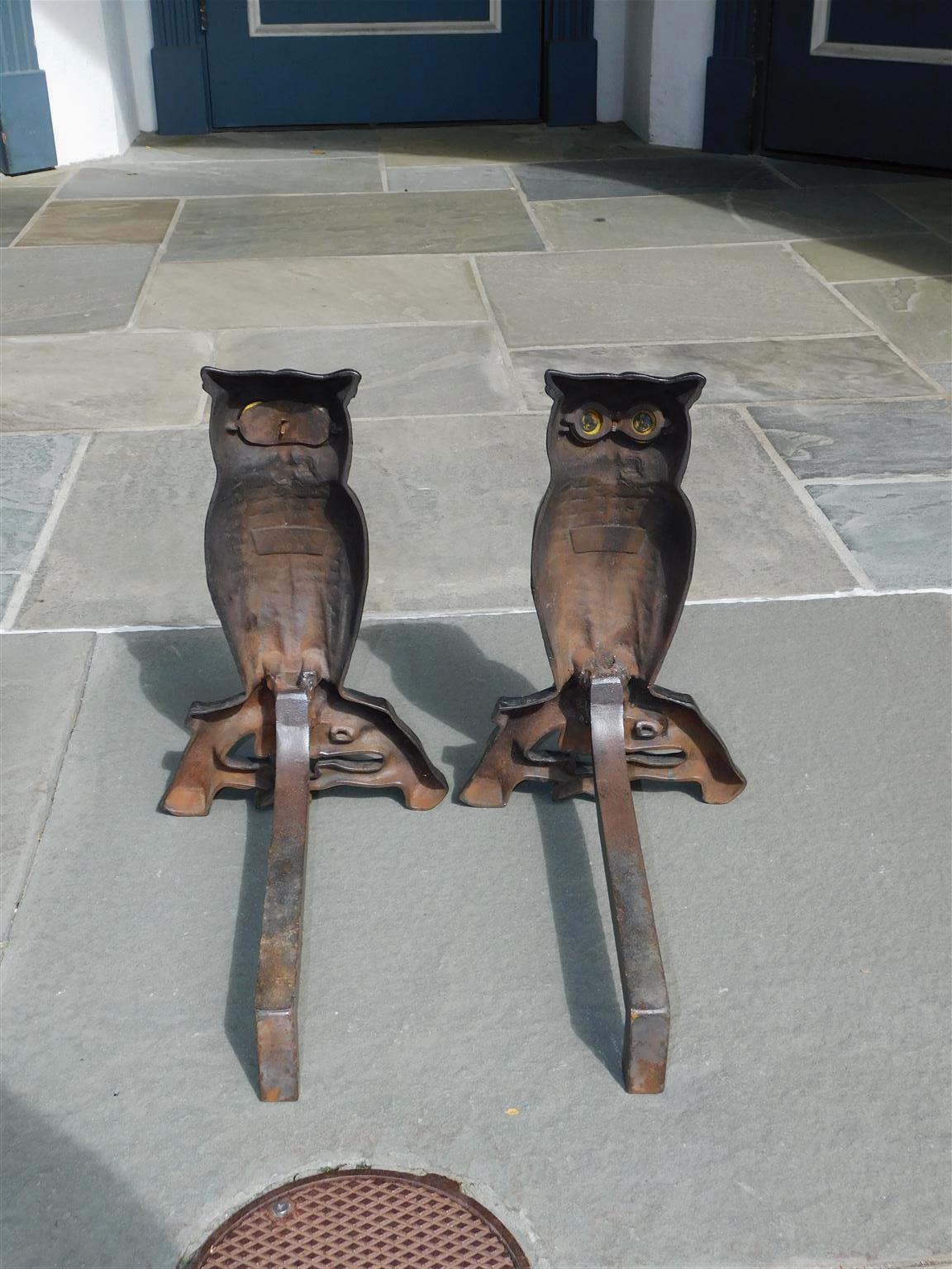 antique owl andirons with glass eyes